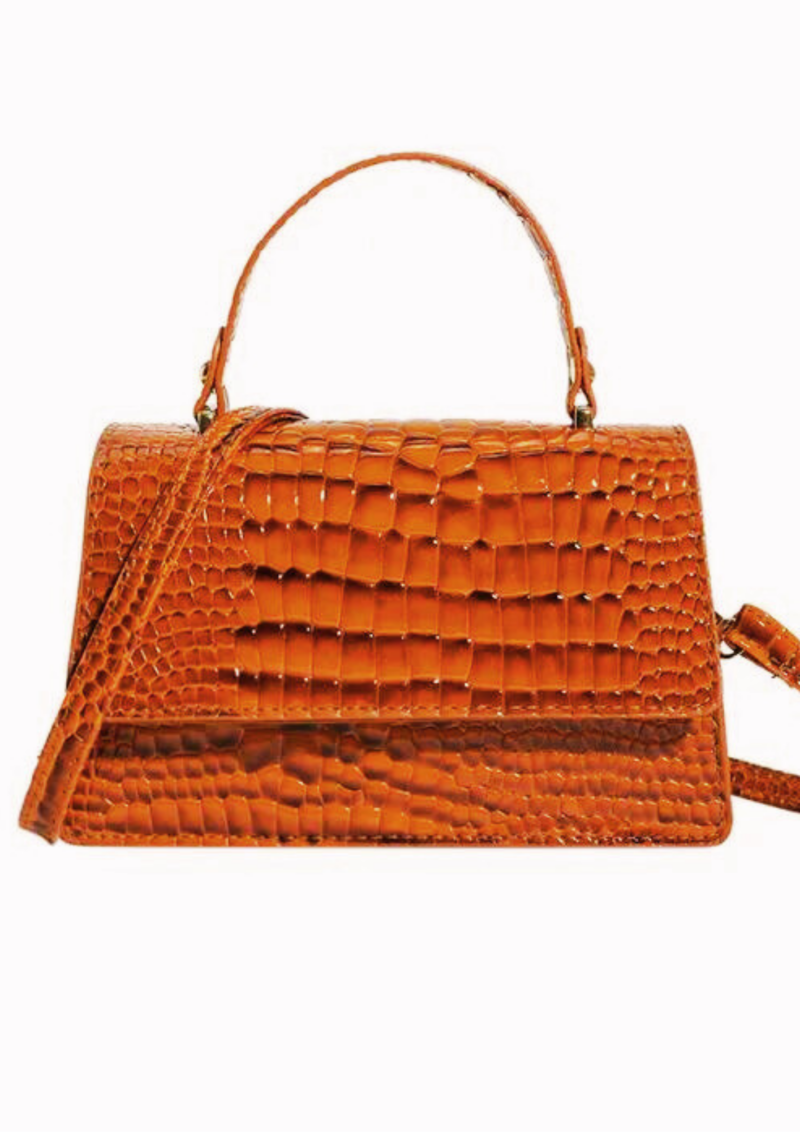 The Bollywood Bliss Shoulder Bag is a versatile accessory that effortlessly enhances any outfit. Pair it with a casual sundress and sandals for a laid-back, yet stylish daytime look, perfect for a brunch date or a relaxed outing with friends. For a trendy, urban-inspired ensemble, complement your favorite jeans and a blouse with this shoulder bag, elevating your everyday attire with a touch of Bollywood flair. Its playful sophistication makes it an ideal accessory to mix and match with various outfits, allowing you to express your unique sense of style while exuding an air of elegance and charm.